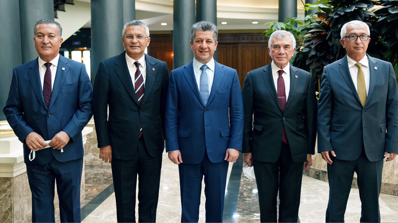 Kurdistan Region Prime Minister Barzani (center) poses for a photo in Erbil alongside a visiting delegation of the Turkish opposition group CHP, Sept. 5, 2021. (Photo: KRG)